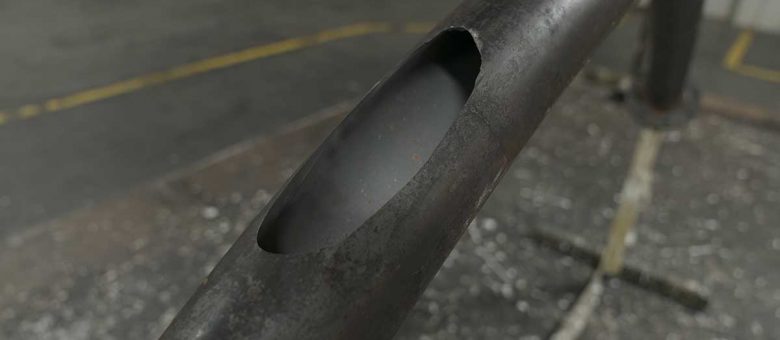 What are the Two Different Types of Wear in Pneumatic Conveying Elbows?