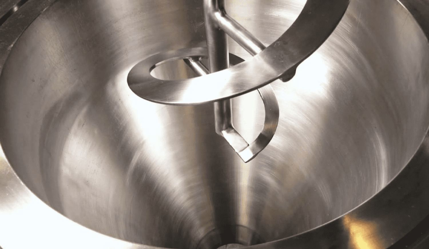 Efficiency in bulk solids mixing: Ribbon versus tumble blenders