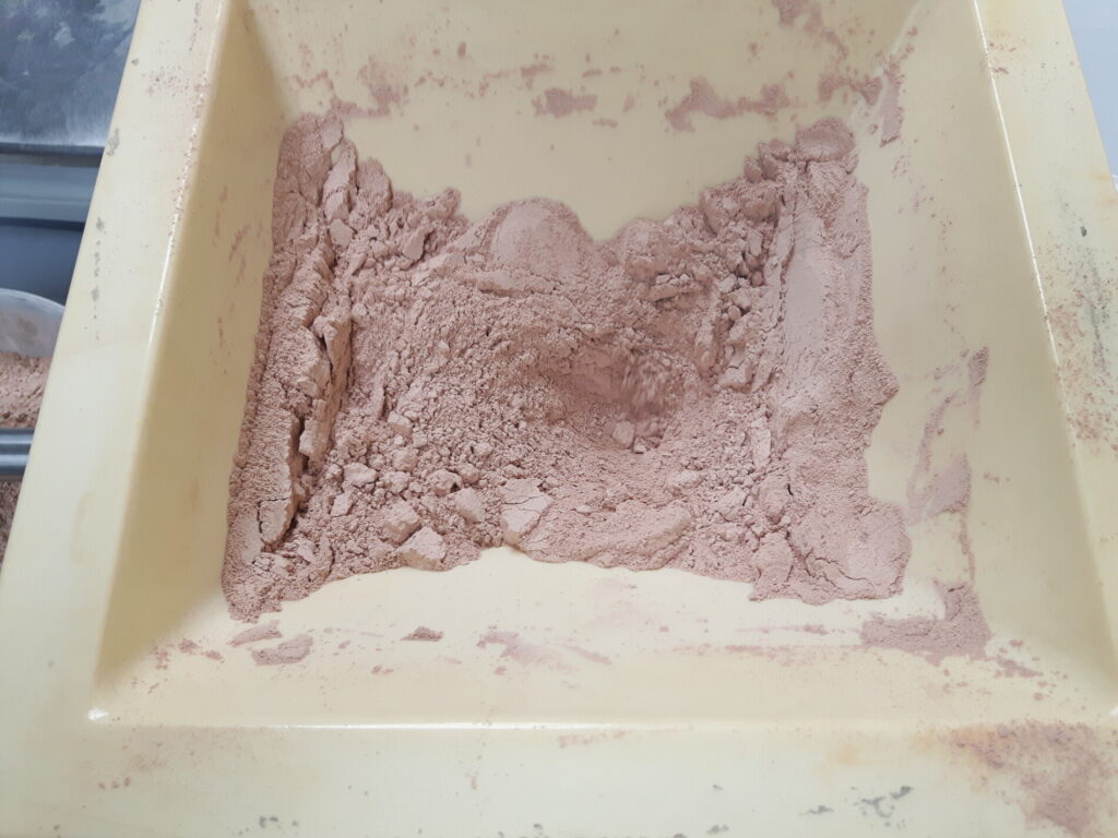 From Ratholing to Reliable Flow: Handling Katechu Powder