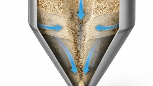 Permeability Collapse in Hopper Discharge: When Air Limits Flow Before Cohesion Does